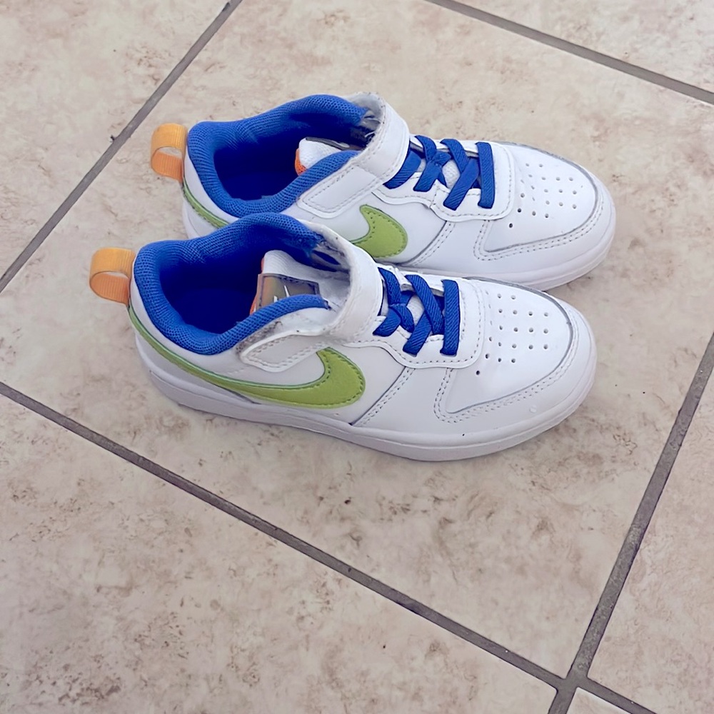 Nike no laces, white, blue, green, orange, and multicolor reflector Nikes.
